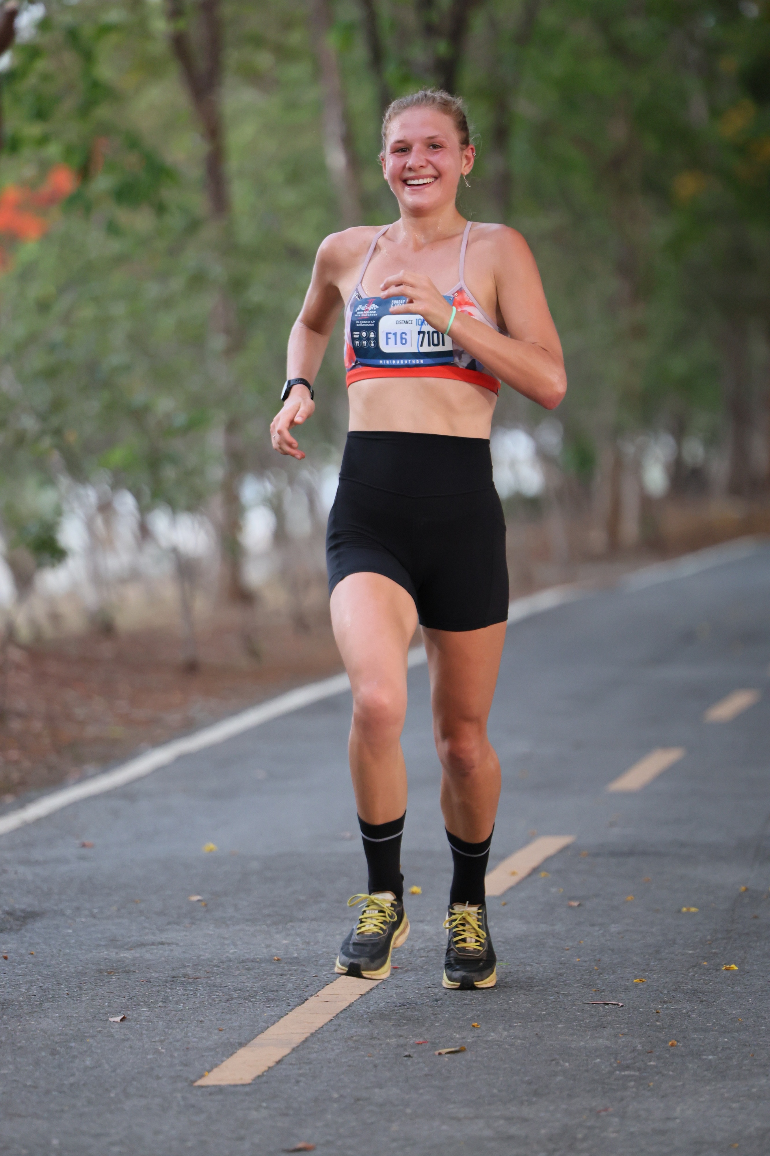 Kiana smiling while running